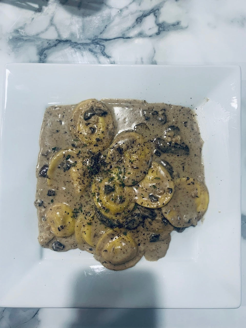 Ravioli in a Truffle Mushroom Sauce